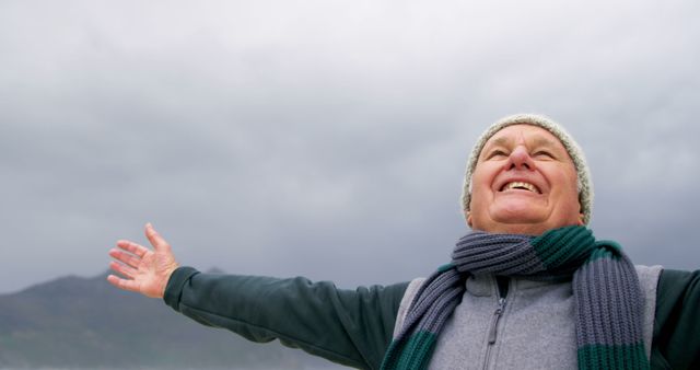 Senior Woman Enjoying Fresh Air in Nature, Arms Outstretched - Download Free Stock Images Pikwizard.com