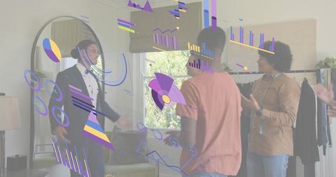 Men's suit fitting with augmented reality overlay, tailors collaborating in living room