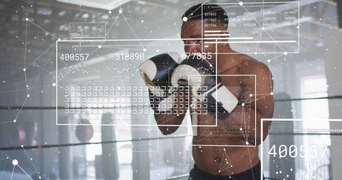 Boxer Throwing Punch with HUD Overlay Showing Performance Data and Training Analytics