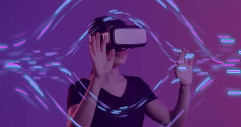 Woman immersed in futuristic vr experience