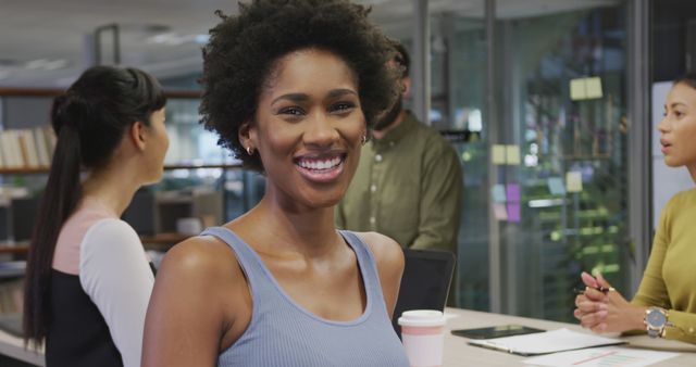 Confident businesswoman in casual attire leading office meeting - Download Free Stock Images Pikwizard.com