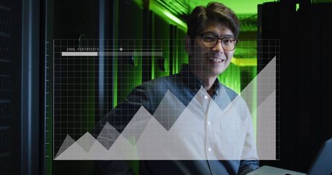 Asian Professional Analyzing Data in Sophisticated Server Room - Download Free Stock Images Pikwizard.com