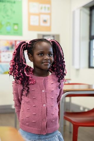 Young Student in Classroom Blooming with Learning Spirit