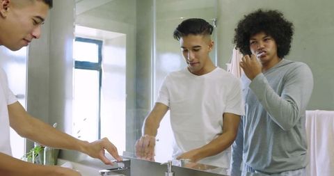 Men Practicing Morning Hygiene, Brushing Teeth and Washing Hands