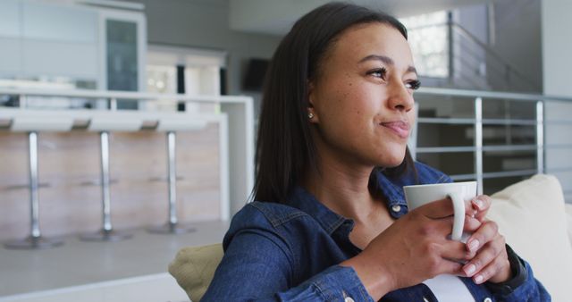 Relaxed Woman Enjoying Hot Beverage at Home - Download Free Stock Images Pikwizard.com