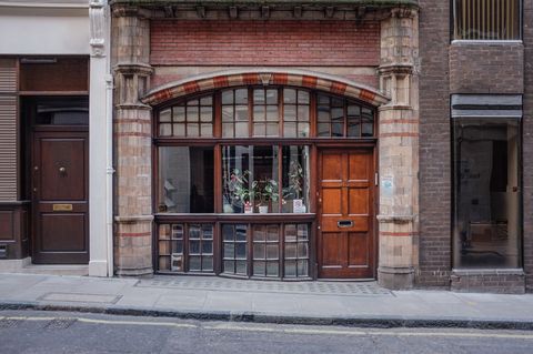 Vintage Storefront with Elegant Brick and Wood Facade