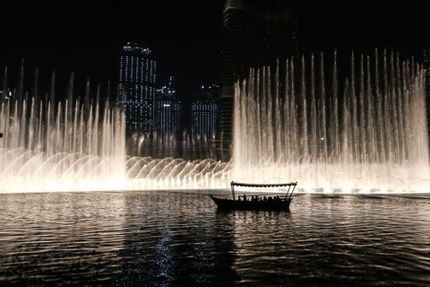 Majestic Night View of Dubai Fountain with Illuminated Cityscape