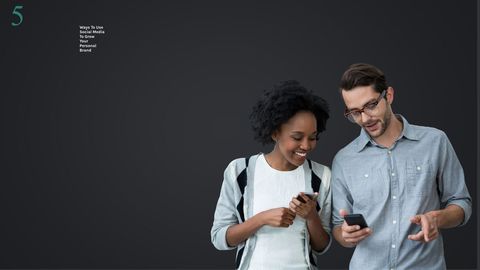 Happy diverse couple engaging with smartphones on social media