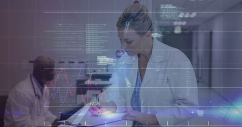 Medical Professional Analyzing Digital Patient Data in Modern Hospital Setting