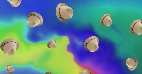Falling hats over colorful abstract background