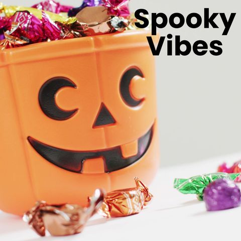 Pumpkin Basket Filled With Sweets for Halloween Celebration - Download Free Stock Templates Pikwizard.com