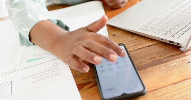 Hands Typing on Smartphone with Laptop and Documents on Desk - Download Free Stock Images Pikwizard.com