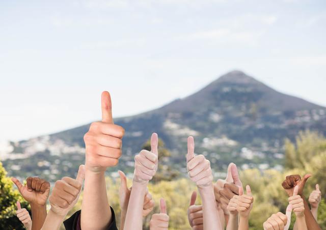 Digital composite of Thumbs up mountain
