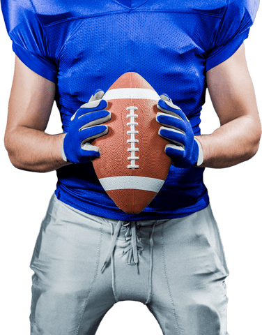 American football player holding ball on transparent background