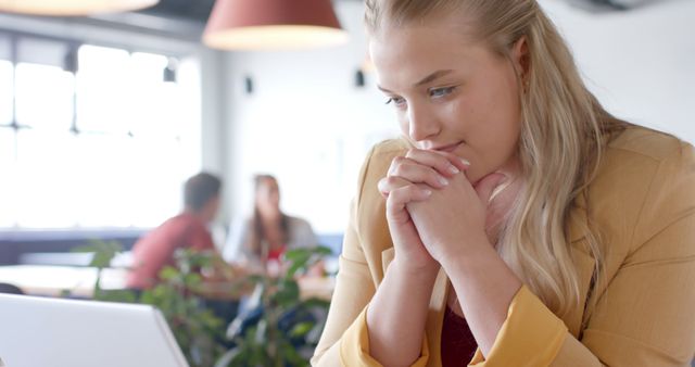 Young Woman Concentrating While Working in Modern Office - Download Free Stock Images Pikwizard.com