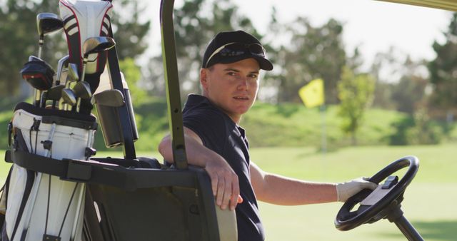 Image of happy caucasian man sitting in cart on golf field - Download Free Stock Photos Pikwizard.com