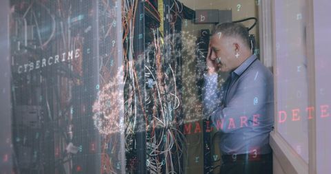 Businessman Analyzing Servers and Cybersecurity Concepts - Download Free Stock Images Pikwizard.com