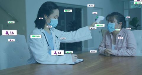 Doctor measuring patient temperature with contactless thermometer wearing masks