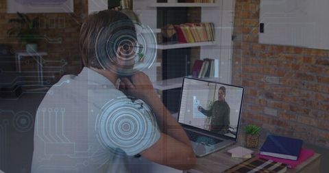 Teacher Conducting Virtual Class with Futuristic Graphics Overlay