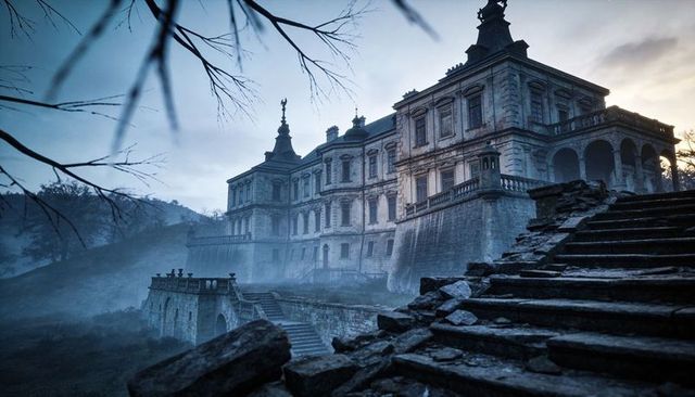 Weathered gothic manor looming on misty terrace with crumbling stone staircase