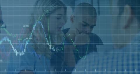 Business Team Analyzing Financial Data with Overlaid Graphs