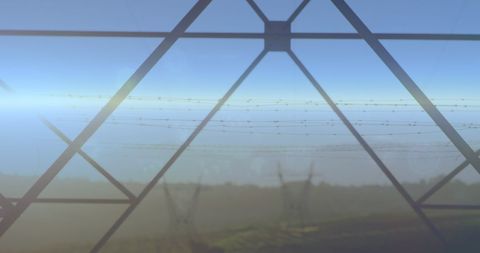 Blended light trails and electricity pylons horizon