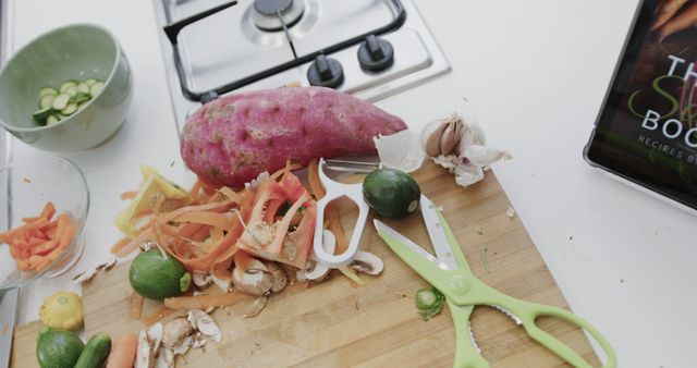 Kitchen Counter with Vegetable Peelings and Cooking Utensils - Download Free Stock Images Pikwizard.com