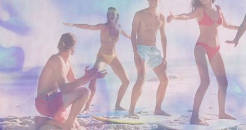 Energetic Group Practicing Surf Stance on Sunny Beach