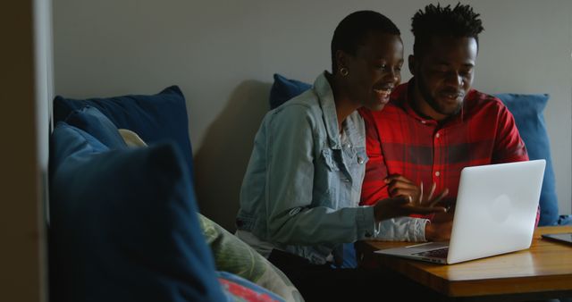 Happy African American Couple Using Laptop Together at Home - Download Free Stock Images Pikwizard.com