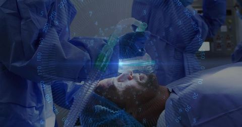 Anesthetist administering ventilation mask with hud overlay during surgical procedure