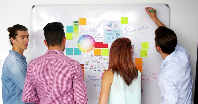 Team Discussing Design Strategy on Whiteboard in Office Meeting - Download Free Stock Images Pikwizard.com