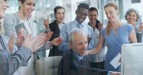 Diverse Team Celebrating Successful Business Achievement