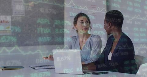 Businesswomen Analyzing Stock Market Data with Digital Graph Overlay - Download Free Stock Images Pikwizard.com