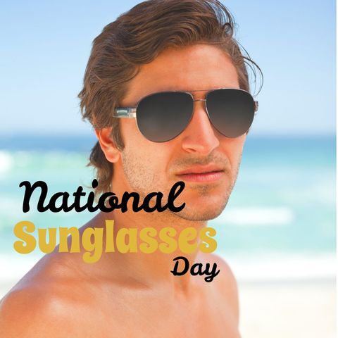 Stylish Young Man Celebrating National Sunglasses Day at Beach