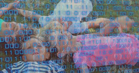 Children Lying on Grass with Binary Code Overlay Suggesting Digital Play and Coding