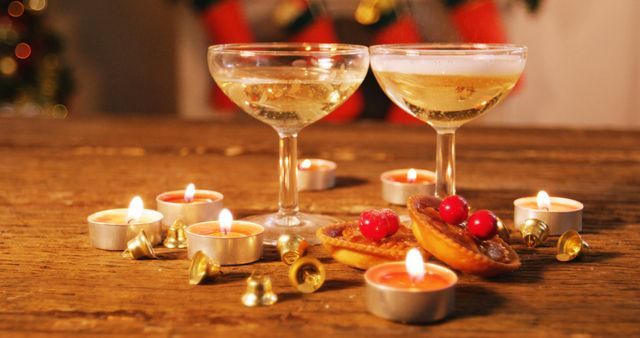 Festive Champagne Celebration with Candlelight and Holiday Treats - Download Free Stock Images Pikwizard.com