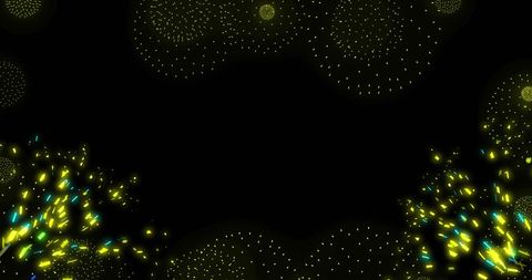 Glowing fireworks on black background for new year celebration