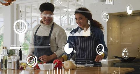 Couple cooking with augmented reality overlays chopping peppers on wooden kitchen island
