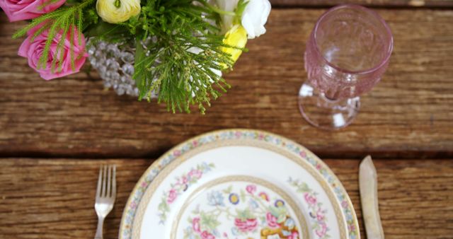 Elegant Floral Table Setting with Vintage China and Pink Glass - Download Free Stock Images Pikwizard.com