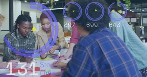 Diverse team collaborating around table with augmented HUD overlay for strategy