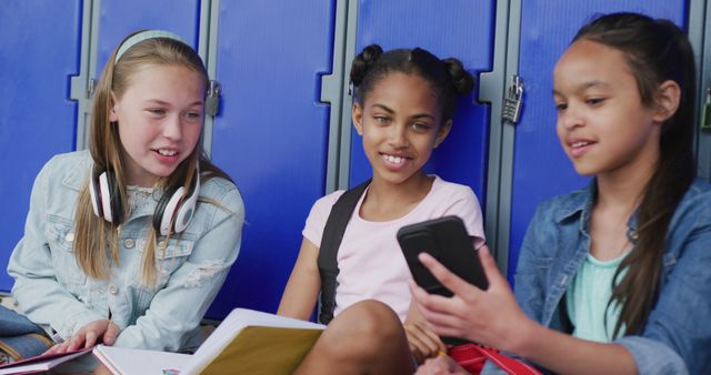 Diverse Schoolgirls Socializing Near Lockers During Break - Download Free Stock Images Pikwizard.com