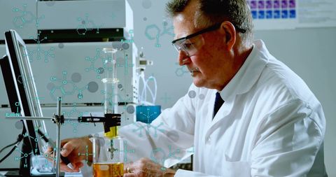 Male Scientist Evaluating Data in Modern Laboratory - Download Free Stock Images Pikwizard.com