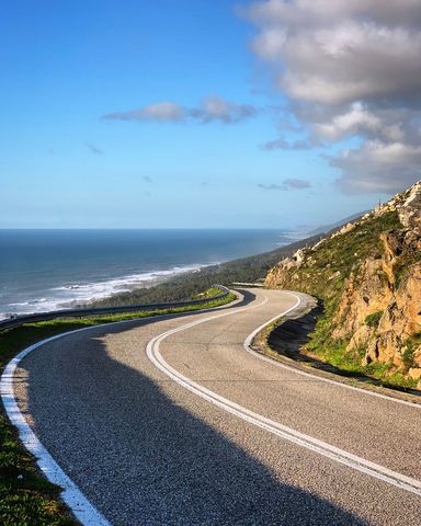 Beach scenic coastal road bend on a sunny day