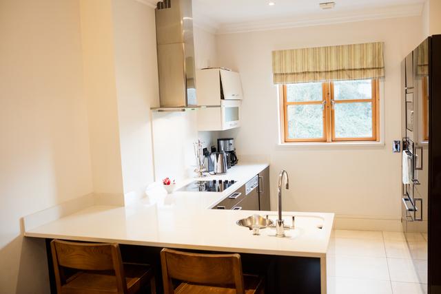 Modern Minimalist Kitchen with White Countertops - Download Free Stock Photos Pikwizard.com