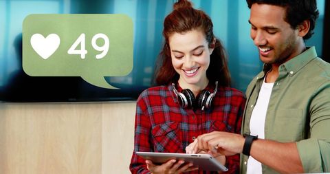 Young Friends Enjoying Social Media Interaction with Tablet