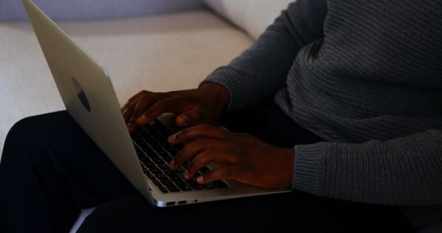 Man Typing on Laptop at Home in Evening - Download Free Stock Images Pikwizard.com