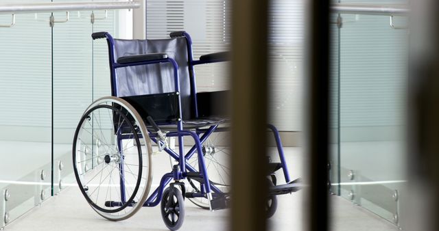 Empty Wheelchair in Modern Hospital Hallway - Download Free Stock Images Pikwizard.com