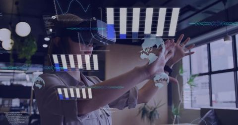 Businesswoman Engaging with Virtual Data using VR Headset in Modern Office