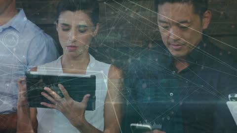 Business Professionals Using Digital Devices with Data Overlay