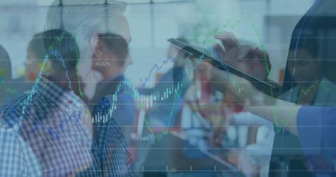 Business team tapping tablet and analyzing financial charts for strategy and growth